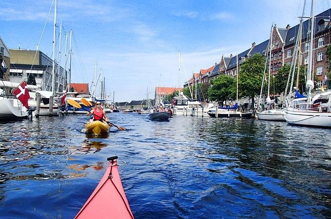 2 Hours Guided Kayak Tour in Copenhagen Harbor - Returning under a pedestrian and cycling bridge