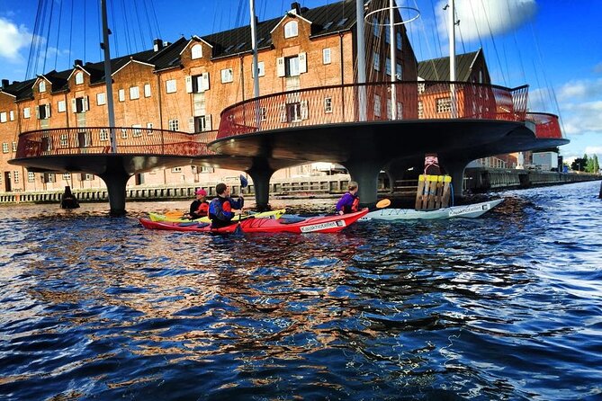 2 Hours Guided Kayak Tour in Copenhagen Harbor - Paddling beneath the bridge toward Copenhagen’s canals