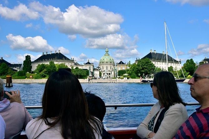 Copenhagen Sightseeing Classic Canal Tour With Live Guide - Christianshavn, old warehouses, and canal life